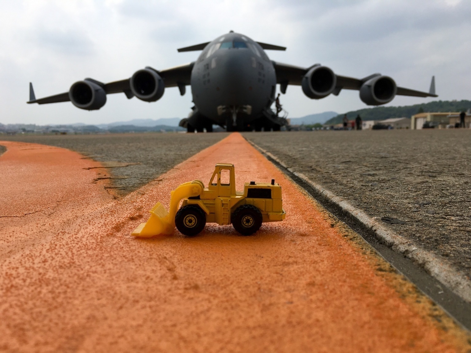 A pilot places his son's toys in random places whenever he is working somewhere around the world.