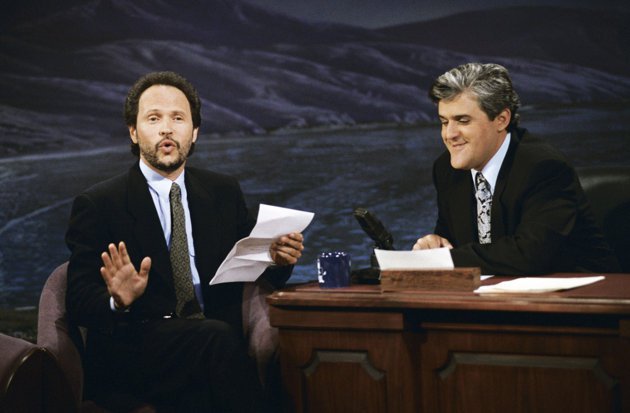 Jay Leno as a host on The Tonight Show.
Johnny Carson ended his run on the NBC late-night show on May 22nd, and three days later Jay Leno was the new host. Billy Crystal was his first guest.
