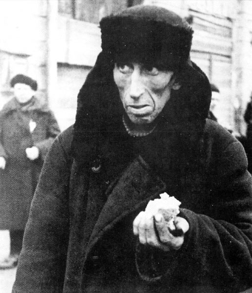 A man holding his daily ration of food (125 grams of bread, of which 50–60% consisted of sawdust) during the Siege of Leningrad, 1941-1944.

More civilians died of starvation, cold and disease in the first few months of the siege than all the US Military deaths in all theaters of the war.
Total US military deaths from all causes: 407,000
Total number of dead from the beginning of the siege, September ’41, to December ’41: 780,000, almost entirely civilian deaths.
And the siege lasted 900 days. Out of a population of around 3.5 million civilians, 400,000 survived in the city.