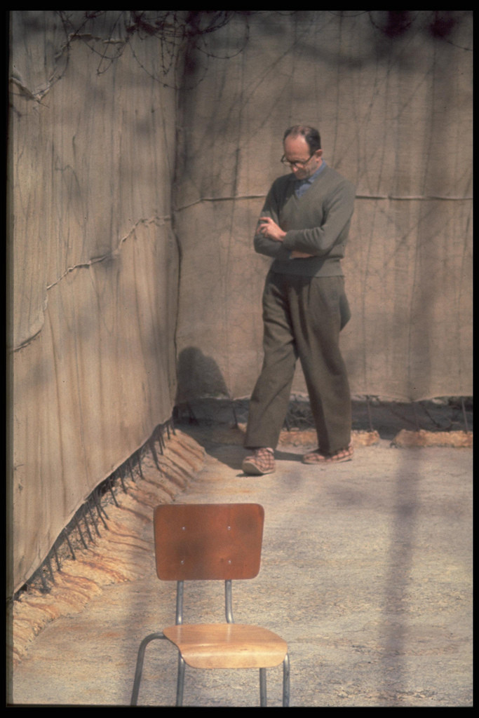 Adolf Eichmann walks around the yard of his cell, Israel, April 1961.

A German Nazi SS-Obersturmbannführer (lieutenant colonel) and one of the major organisers of the Holocaust. Eichmann was tasked by SS-Obergruppenführer (general/lieutenant general) Reinhard Heydrich with facilitating and managing the logistics of mass deportation of Jews to ghettos and extermination camps in German-occupied Eastern Europe during World War II. In 1960, he was captured in Argentina by Mossad, Israel’s intelligence service. Following a widely publicised trial in Israel, he was found guilty of war crimes and hanged in 1962.