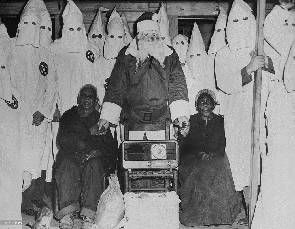 December 1948, Talladega, AL., Klansmen and Santa Claus presented a radio to Jack Riddle, a 107 year old Negro and his wife, Josey, 86, so they could have their wish, to “hear the preachers.” Grand Dragon Samuel Green explained that this demonstrated the true heart of a Klansman.