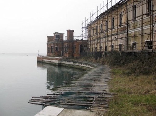 Poveglia Island, Italy.
We’ve written about this one before, but this island off the coast of Venice is the most haunted place in Italy. Over its years, it’s been a plague victim dumping ground, a graveyard and a mental hospital where strange experiments are conducted.
Its rumoured that the mad doctor in charge of the experiments was pushed off the bell tower by unseen hands and suffocated by a fog after surviving his fall. The island’s been left to rot since 1968, and no one is permitted to visit.