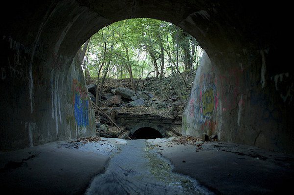 The Gates of Hell, New Jersey.
This is a legendary passageway that leads to a network of underground tunnels and storm sewers, and, according to rumours, the lair of the devil himself.
While other drains and tunnels are square and full of water, this tunnel is made of stone, always dry and filled with satanic symbols, bones and other esoteric items. There’s also a legend that if you follow the tunnels all the way down, there’s a room only a few can enter, with a glowing skull and the devil himself. Go Devils.