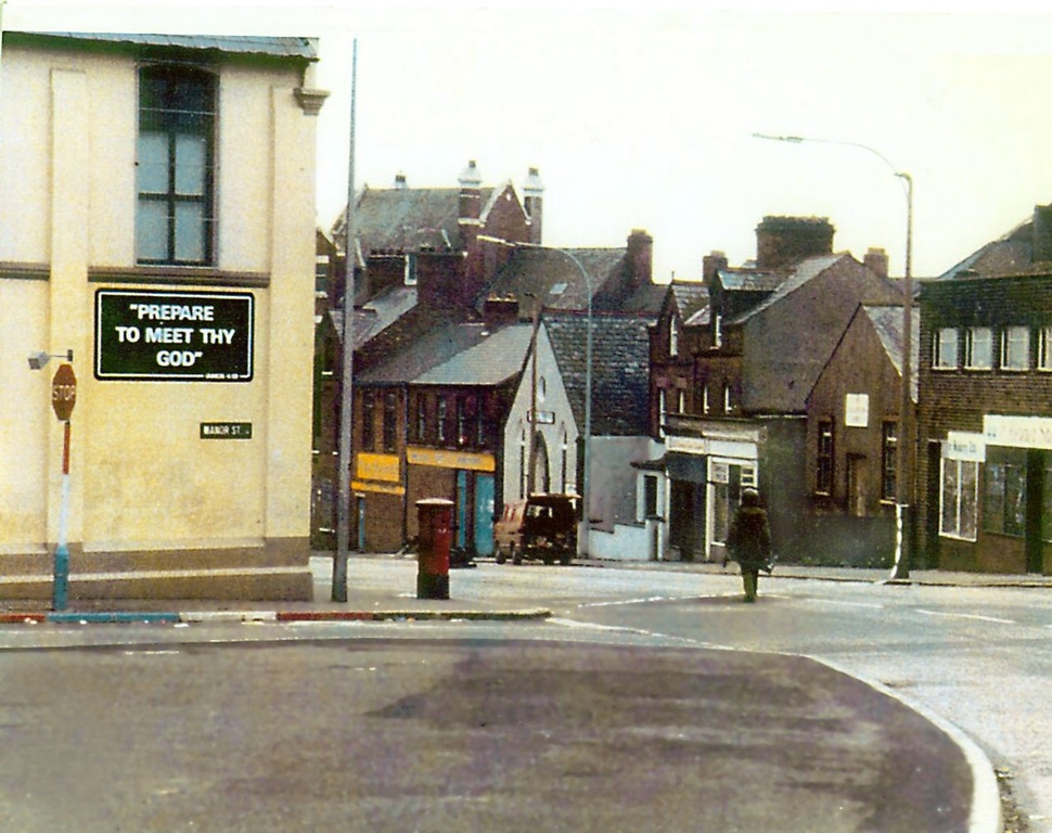 A British Army bomb-disposal specialist approaches a car bomb during the Troubles in Northern Ireland, ca. late 1970’s