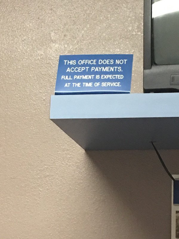 there was an attempt signage - This Office Does Not Accept Payments. Full Payment Is Expected At The Time Of Service.