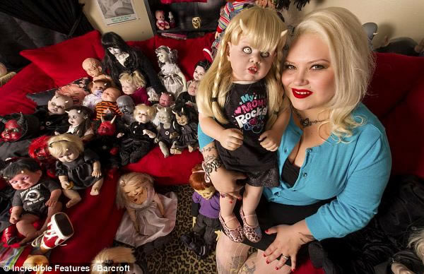 Marilyn Mansfield has spent tens of thousands of dollars on her incredible doll collection, which includes 300 ultra-realistic handmade dolls. Every room in her Staten Island, New York home is filled with them, and she cares for them like they are her children. 

Marilyn, 36, takes them for walks in a stroller, feeds them, and cuddles them. Husband Zoth Ommog, 40, fully supports her obsession, and the family always makes room for additions. While Marilyn sometimes receives negative criticism for her inanimate family members, some people are fooled by their realistic qualities.