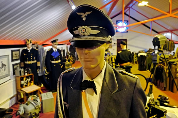 birthday present from his parents—a bullet-pocked SS helmet with lightning bolts on the ear-flaps. The next year, at a car auction in Monte Carlo, he asked his multimillionaire father for a Mercedes—the G4 that Hitler rode into the Sudetenland in 1938.

When Wheatcroft was 15, he spent his birthday money on three WWII Jeeps recovered from the Shetlands, which he restored himself and sold for a tidy profit. He then invested the proceeds into four more vehicles and a tank.

Wheatcroft is now 55 and worth $190 million. He lives in Leicestershire, England, where he looks after the property portfolio of his late father and oversees the management of a racetrack and motor museum.

The ruling passion of his life, though, is what he calls the Wheatcroft Collection, which is widely regarded as the world's largest accumulation of German military vehicles and Nazi memorabilia. The collection has largely been kept in private, under heavy guard, in a warren of industrial buildings. There is no official record of the value of Wheatcroft's collection, but some estimates place it at over $160 million.