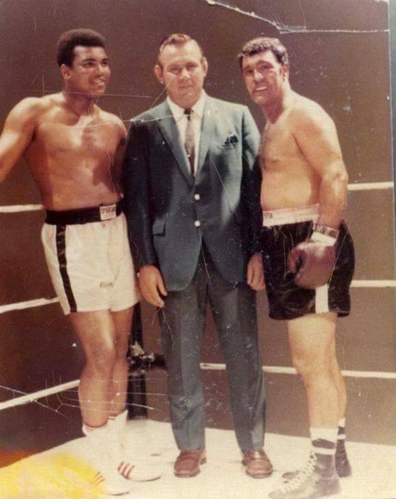 Ali and Marciano before the filming of their fantasy fight.

While still banned from sanctioned bouts, Ali accepted $10,000 to appear in a privately staged fantasy fight against retired champion Rocky Marciano. In 1969 the boxers were filmed sparring for about 75 one-minute rounds; they acted out several different endings. A computer program purportedly determined the winner, based on data about the fighters. Edited versions of the bout were shown in movie theaters in 1970. In the U.S. version Ali lost in a simulated 13th-round knockout, but in the European version Marciano lost due to cuts, also simulated.  Ali jokingly suggested that prejudice actually determined his defeat in the U.S. version. He was reported to say, “That computer was made in Alabama.”