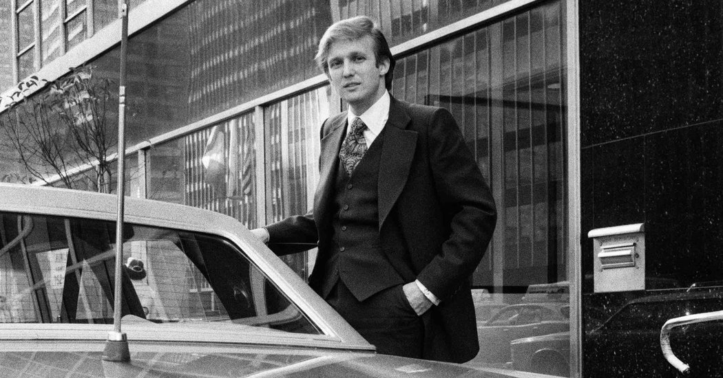 Donald Trump (age 24) outside his car in New York City in 1970