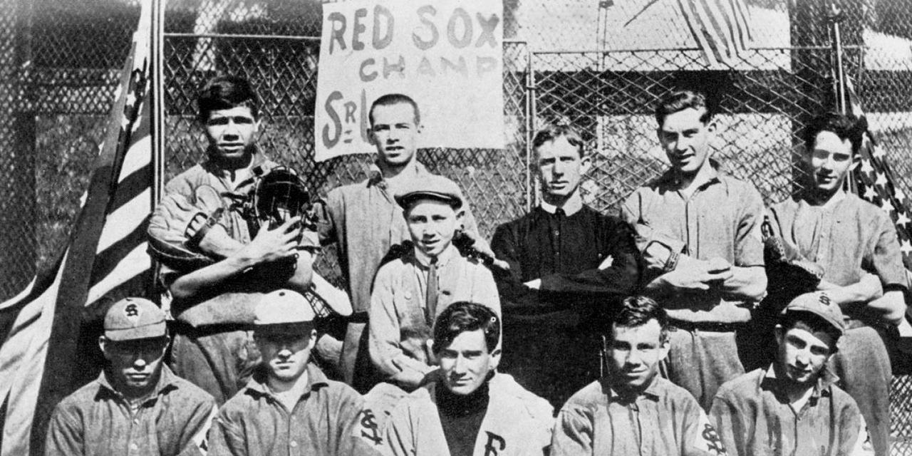 Babe Ruth (top left) and The St. Mary’s Industrial School team of Baltimore poses for a portrait sometime between 1910 and 1912.