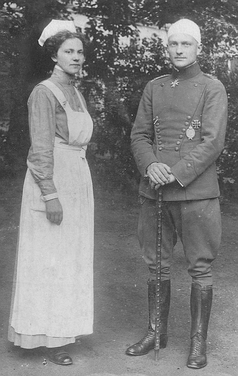 Baron Manfred Von Richthofen (AKA the Red Baron) being treated from a gunshot wound to the head by nurse Fraulein Kätie Otersdorf in 1917.
