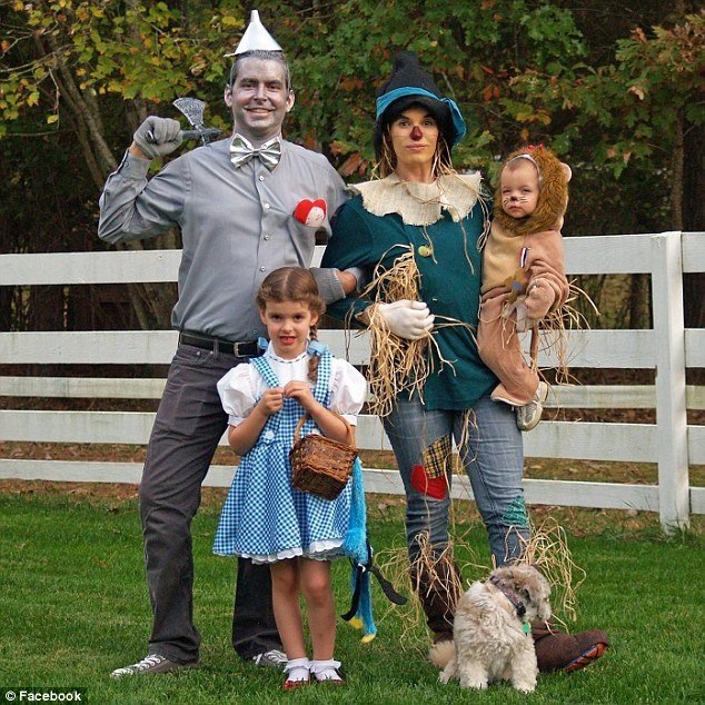 Lance Calvin Buckley with his wife and daughters this Halloween. Three weeks later he murdered all three, then killed himself.