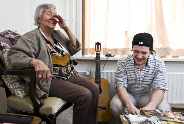 There is a long-term care facility in the Netherlands that allows college students to stay for free in exchange for 30 hours of volunteer per month. When students come home from a class, concert, or party, they share those experiences with their elderly neighbors, some of whom are over 90