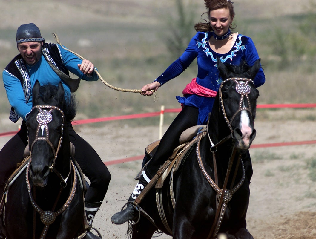 Among Turkic peoples, there is a sport called “girl chasing”, in which a man and a woman race against each other on horseback. If the man wins, he gets a kiss from the woman. If the woman wins, she gets to beat the man with a whip.