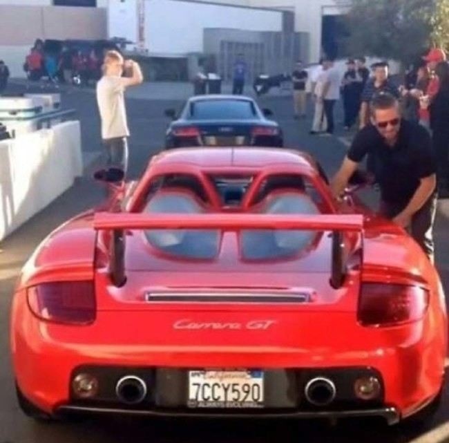 Paul Walker.
A photo of the beloved Fast and the Furious actor leaving a charity event for Typhoon Haiyan just before his huge car accident. The car crashed into a lamp post and trees from speeding prior to blowing up in flames.