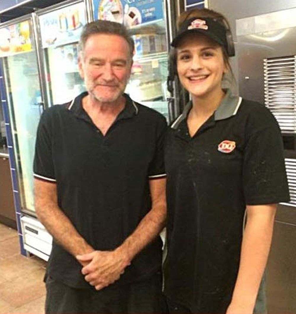 Robin Williams.
A photo with Robin with a young fan from Dairy Queen days before he hung himself in his private home. This took place shortly after he had been diagnosed with Parkinson's disease.