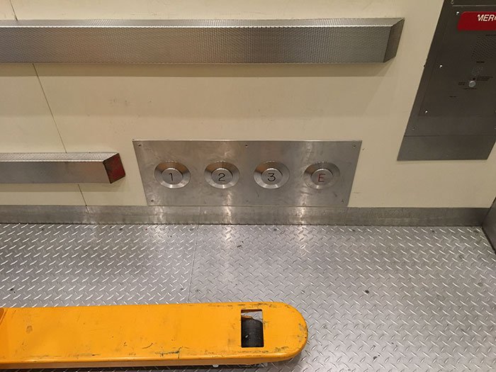 Elevator buttons conveniently located near your feet, for those times when your hands are full.