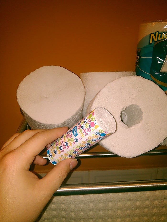A toilet paper roll with a smaller roll inside to on the go.