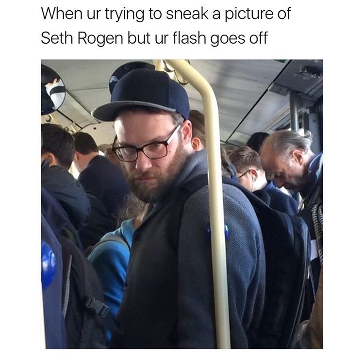 Funny candid picture of man with a beard captioned that it is a pic of Seth Rogan.