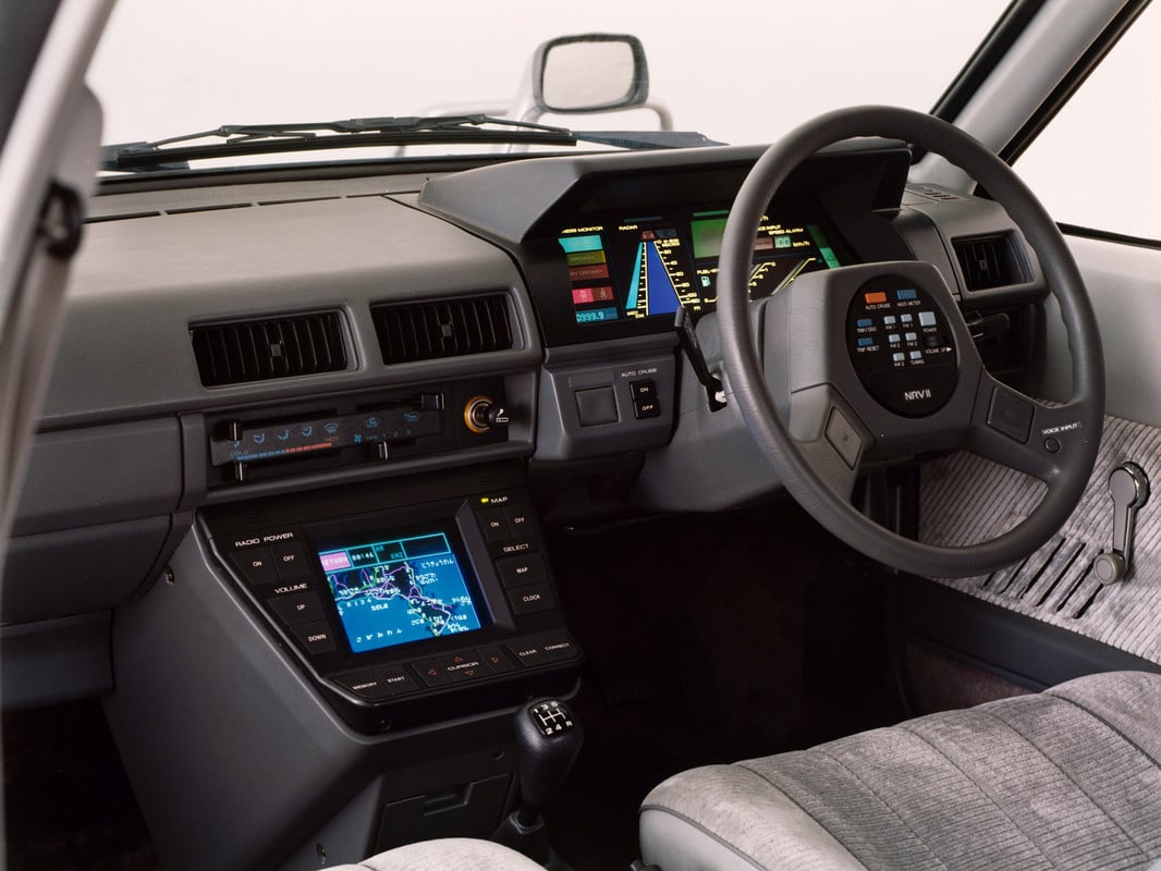 Nissan’s 1983 vision of what their interiors could look like in the future. 

Car navigation, integrated display as dashboard, everything can be controlled with buttons on the wheel, voice control system. They were pretty spot on except for the style.