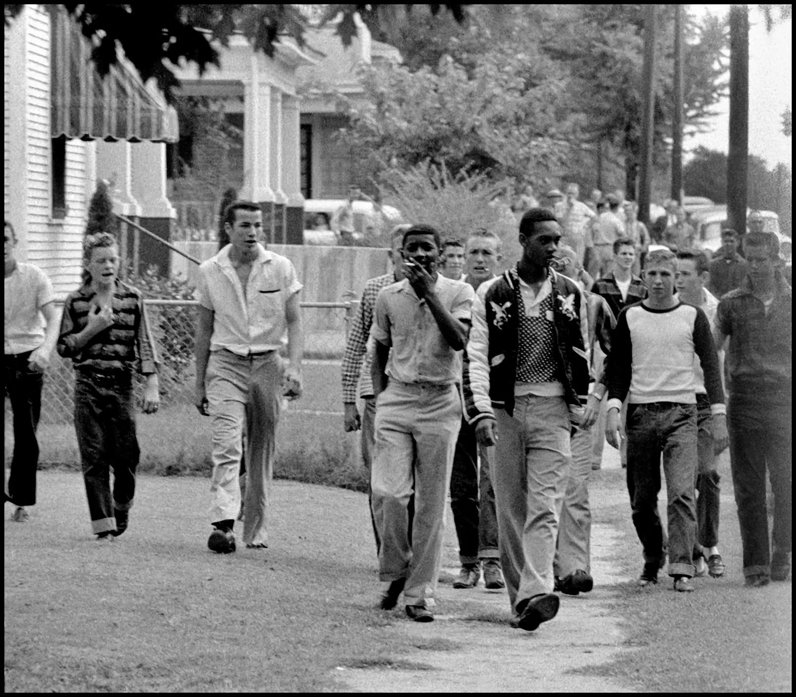 Two black students are harassed by classmates on their way to school – Little Rock, Arkansas 1957