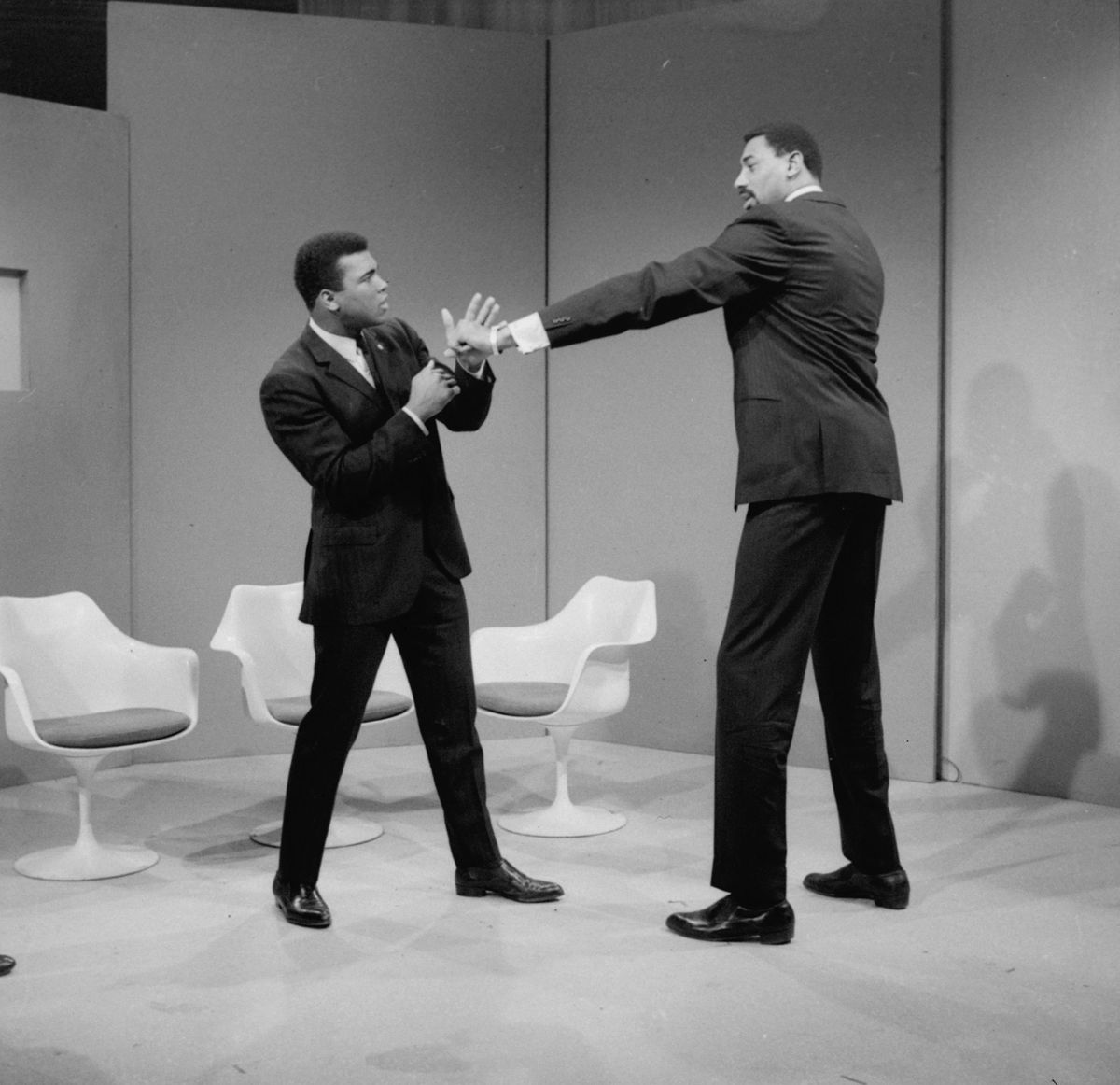 Wilt Chamberlain demonstrates his reach to Muhammad Ali – 1967