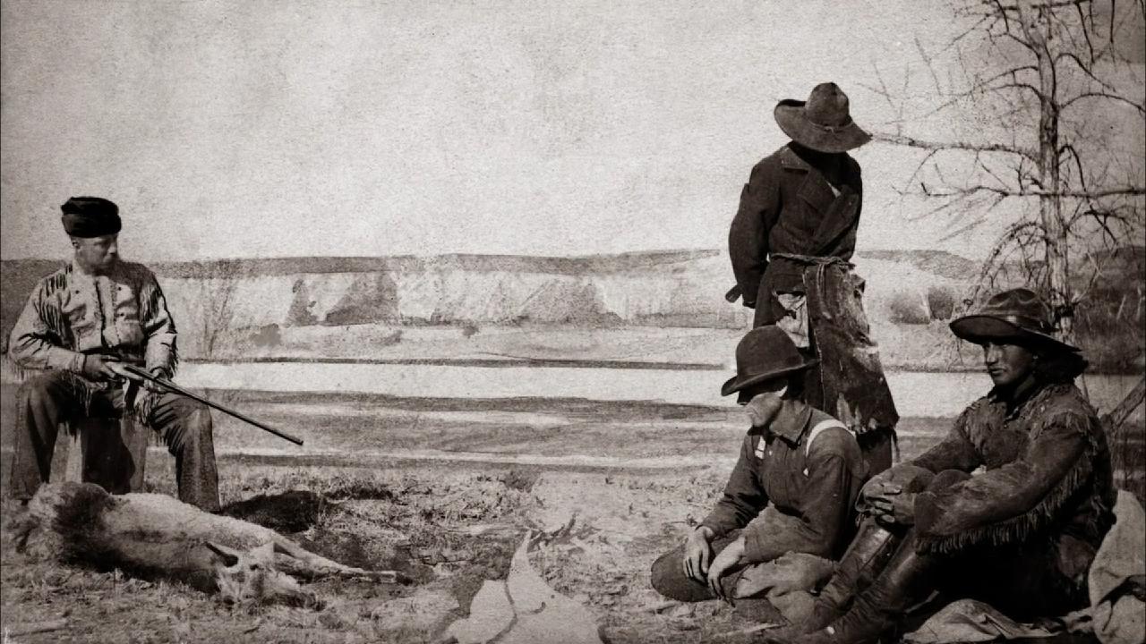 Teddy Roosevelt as a young man making 3 thieves he captured pose for his box camera, 1886