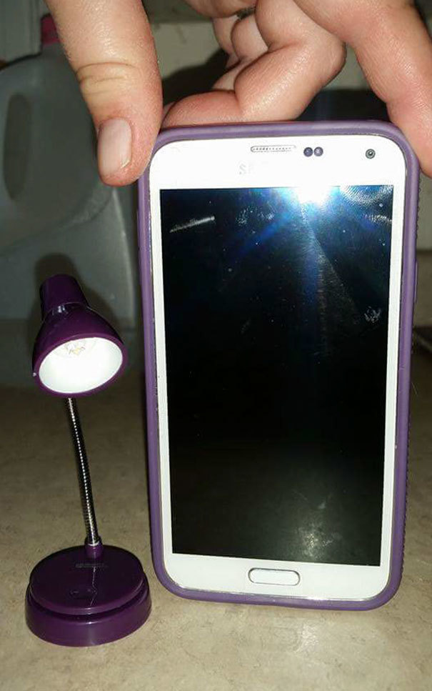 They ordered a desk lamp from Amazon without reading the specs.
Is the lamp small or is the phone really just that big?