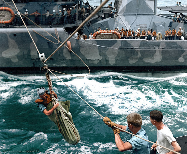 A breeches buoy is put into service to transfer from a U.S. destroyer to a cruiser survivors of a ship, November 14, 1942 which had been sunk in naval action against the Japanese off the Santa Cruz Islands in the South pacific on October 26.