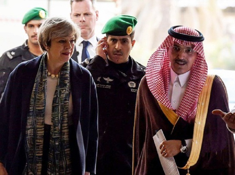 British Prime Minister Theresa May has defied Saudi Arabia’s strict custom and refused to wear a headscarf for her first meeting with the Arab country’s ruling elite