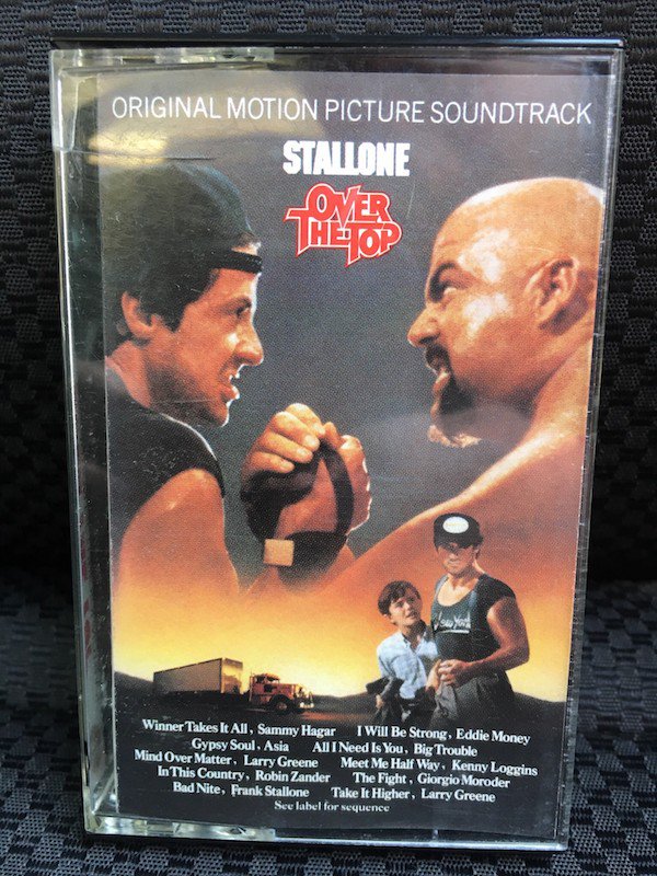 poster - Original Motion Picture Soundtrack Stallone Theo Winner Takes It All, Sammy Hagar I Will Be Strong, Eddie Money Gypsy Soul. Asia All I Need Is You, Big Trouble Mind Over Matter. Larry Greene Meet Me Hall Way, Kenny Loggins In This Country, Robin 
