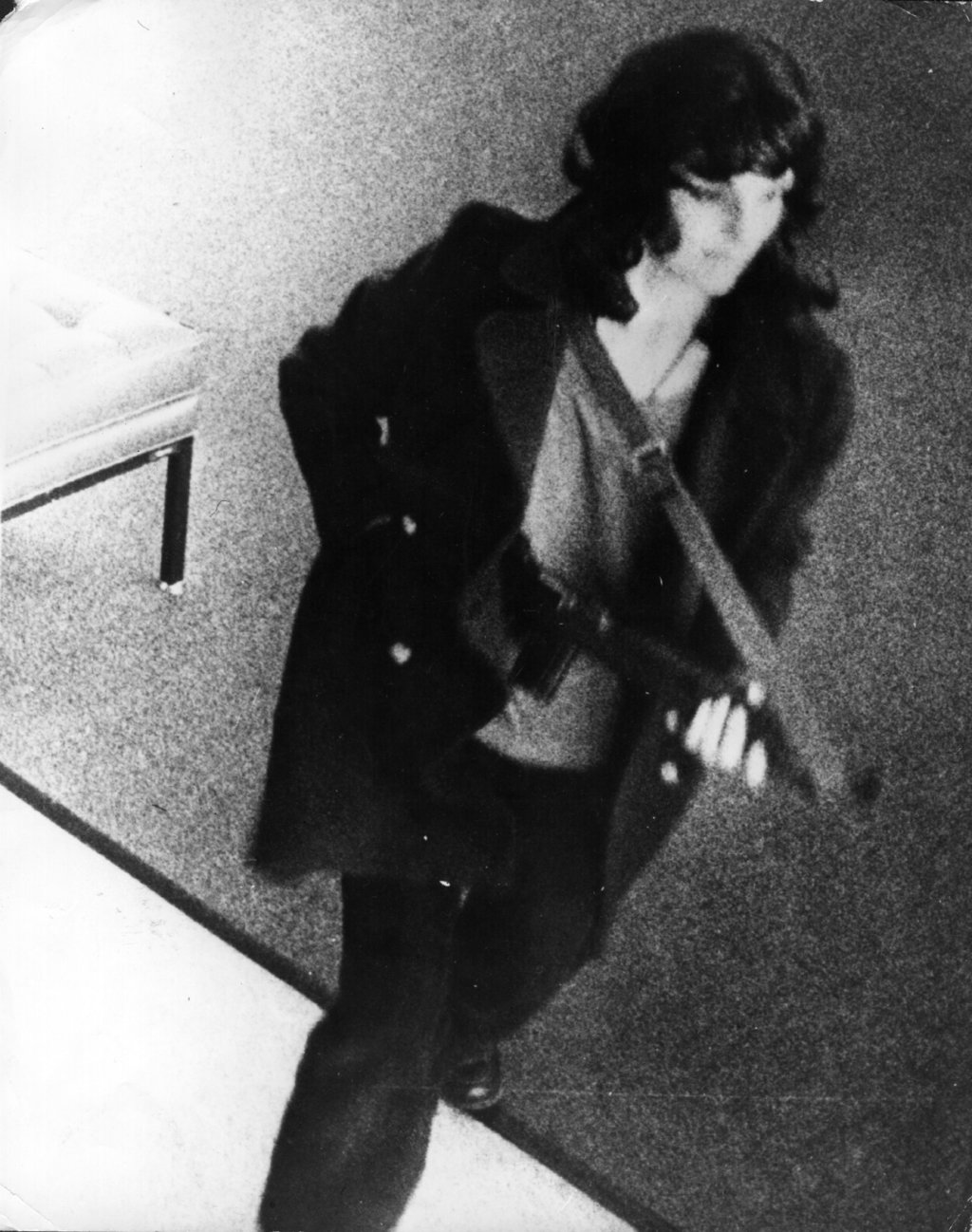 Patty Hearst Robbing the Sunset District branch of the Hibernia Bank in San Francisco at 9:40 A.M. April 15, 1974. Her and the Symbionese Liberation Army (S.L.A.) were in the bank for 4min.

Patricia Hearst Shaw, is the granddaughter of American publishing magnate William Randolph Hearst. She became nationally known for events following her 1974 kidnapping while she was a 19-year-old student living in Berkeley, California. Hearst was abducted by a left-wing terrorist group known as the Symbionese Liberation Army. After being isolated and threatened with death, she became supportive of their cause, making propaganda announcements for them and taking part in illegal activities. Hearst was found 19 months after her kidnapping, by which time she was a fugitive wanted for serious crimes. She was held in custody, despite speculation that her family’s resources would prevent her spending time in jail. At her trial, the prosecution suggested that she had joined the Symbionese Liberation Army of her own volition, and sexual activities between her and SLA members had not amounted to rape. She was found guilty of bank robbery. Hearst’s sentence was commuted by President Jimmy Carter, and she was pardoned by President Bill Clinton.