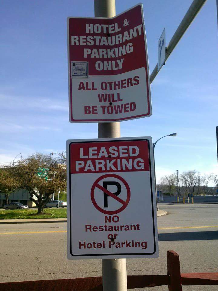 street sign - Hotel & Restauran Parking S Only All Others Will Be Towed Leased Parking No Restaurant or Hotel Parking