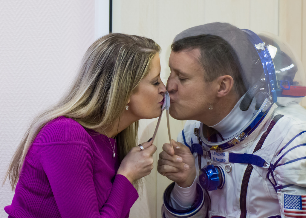 NASA’s Jack Fischer kissing his wife Elizabeth goodbye through glass as he’s quarantined before flying to space.