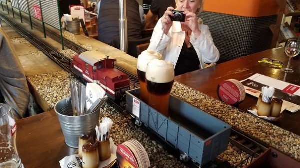 A train-set that can deliver both booze and food? Where does mankind sign-up?!