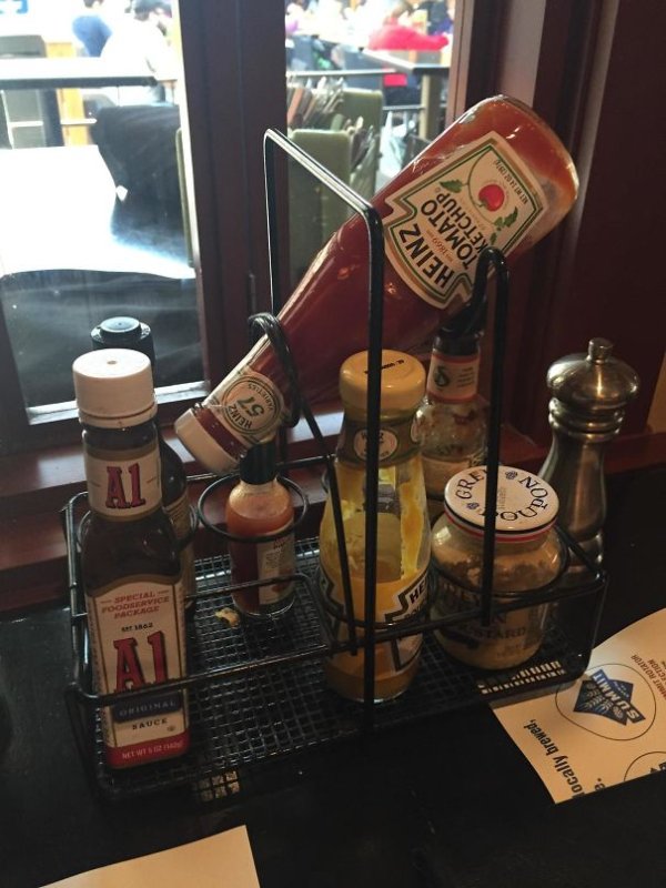A restaurant tabletop condiment caddy helps keep that ketchup/mustard bottle primed and ready to pour smoothly. Not that I don’t enjoy making an ass of myself at the table as I beat a bottle to death in front of complete strangers.