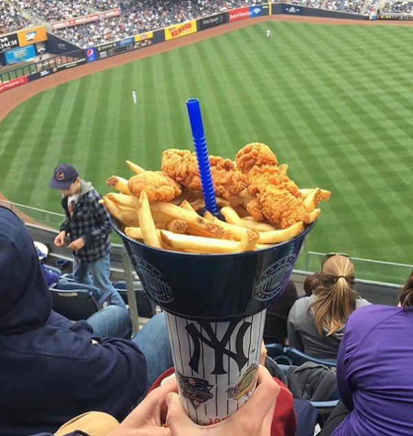 Why the bowl of chicken and fries, with a straw poking through to streamline the consumption process, doesn’t already exist at all ballgames and sporting events is a mystery to me. This lets you have one hand on both your food and beverage, while the other hand shoves the sustenance down your mouth. This could, and should, be used for more food items if you ask me.