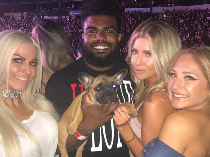 Ezekiel Elliott woos his way into the hearts of hot women everywhere with a cute puppy