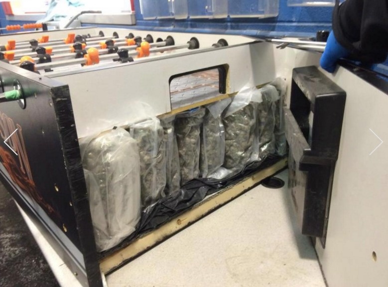 A Canadian woman was arrested for trying to smuggle 50 bags of pot into the US inside a foosball table.