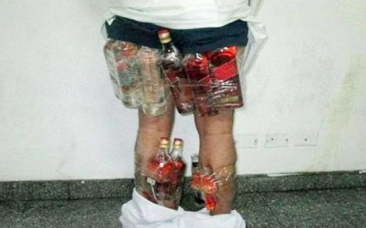 Alcohol is illegal in Saudia Arabia, which explains why this guy was arrested trying to smuggle it inside his clothes.
