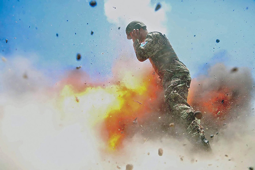 Last photo taken by combat photographer Spc. Hilda Clayton seconds before her death.

“A mortar tube accidentally explodes during an Afghan National Army live-fire training exercise in Laghman province, Afghanistan, July 2, 2013. This photo was taken by U.S. Army Spc. Hilda Clayton, who died in the blast. (US Army)”