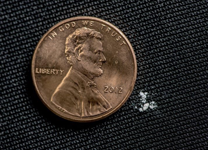 A lethal dose of fentanyl next to a penny