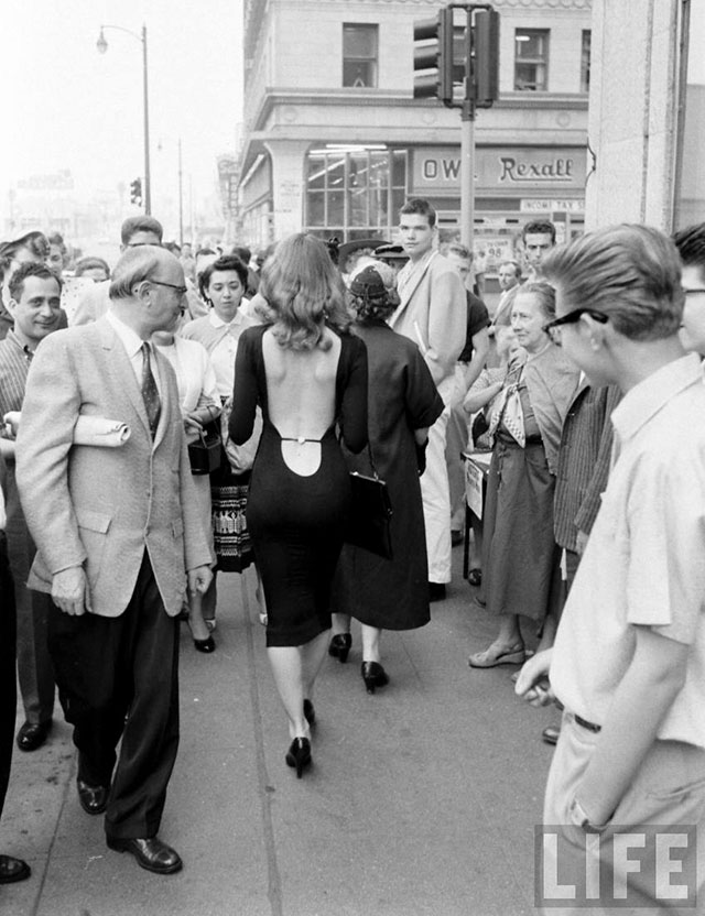 Vikki Dougan walking down the street 1950’s