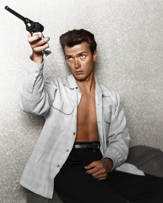 Clint Eastwood checking his revolver, 1962