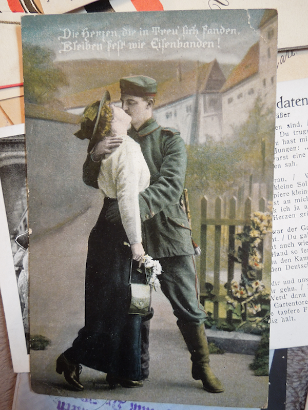 Then there’s this contradiction. This postcard dates back to 1916, with the sweet image of a soldier on the front, kissing his best gal before he goes off to fight in the Great War. Even though he’s a soldier, it’s still a romanticized image.