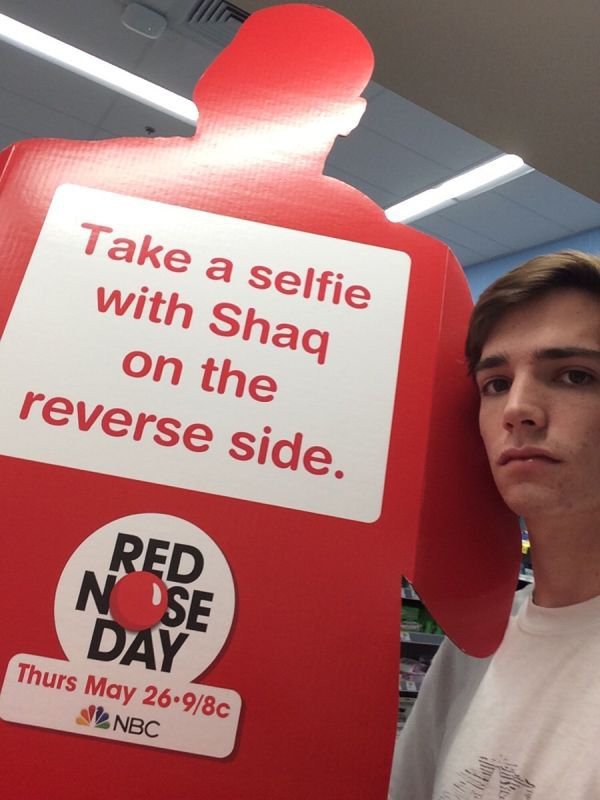 signage - Take a selfie with Shaq on the reverse side. Red Se Day Thurs May 26.98C Nbc