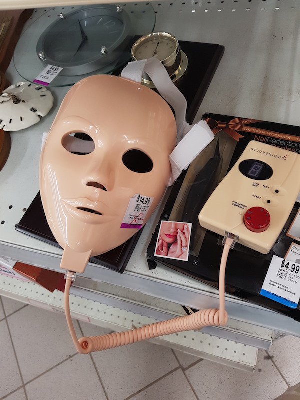 Very strange mask for sale in a thrift shop
