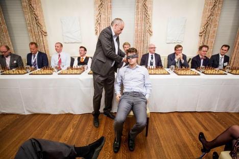 #1 Chess World Champion Magnus Carlson beat ten chess-enthusiast lawyers at the same time. He did it blindfolded, facing the opposite direction. After the matches, he signed an autograph for one of his opponents and proceeded to write a list of every single move that was made in their match.