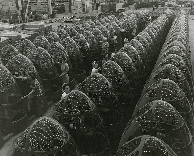 Women employees working on the nose assemblies of Douglas “Havoc” A-20 attack bombers. 1942.

Factories like these are how the US was able to increase aircraft production from under 3,000/year in 1939 to almost 100,000/year in 1944. By war’s end the US had manufactured nearly 300,000 aircraft.