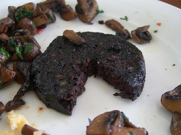 Black Pudding.
This delicacy consists of pigs blood mixed with fat and oatmeal then fried or grilled. I'll take two orders, please.